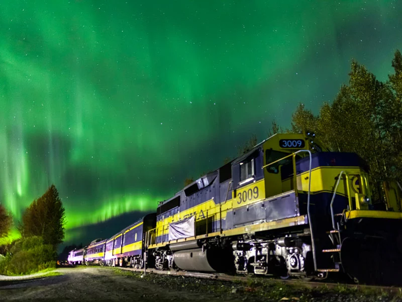 Alaska Northern Lights Train | Aurora, Ice Fishing, Dog Mushing & Sledding